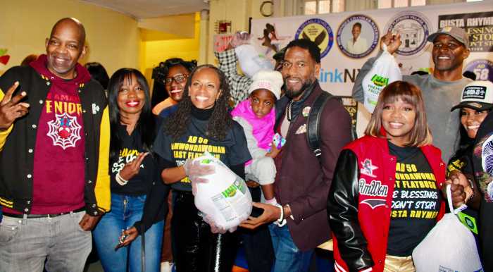 From left, are a guest, PS 135 Superintendent Celeste Terry, Principal of PS 135 Mrs. Mcrae, Assembly Member Monique Chandler-Waterman, Public Advocate Jumaane Williams and his cute daughter, Dr. Meda Leacock, NBA champ Deon, and a guest (partly hidden) during a turkey giveaway at PS 135 on Nov. 22, 2025.