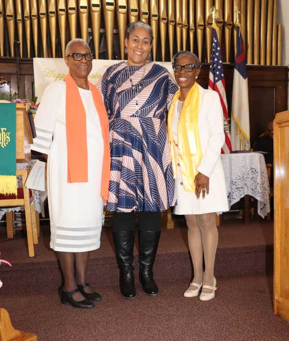 Prof. and author Keisha Anderson, center, wife of Guest Speaker Prof. Martin Felix, with Sis. Joycelyn King, left, and Sis. Marlene Ferguson.