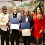 Elected officials on Nov. 15, presented accolades to two humanitarians at the year-end Queens Book Festival & Literary Festival, Inc. and the NYC office of Adult & Continuing Education at the Queens Library in Richmond Hill. From left are representative from Assembly Member David Weprin's office Anthony Lemma, Council Member Kaleel Anderson, honorees Swami Durga Das of the River Fund Pantry, Tony Singh of the Community Pantry, Assembly Member Jenifer Rajkumar, and Dr. Dhanpaul Narine, founder of Queens Book Fair & Literary Festival Inc.