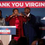 Virginia Republican gubernatorial candidate, Lieutenant Gov. Winsome Earle-Sears, gestures alongside members of her family during her election night watch party, after her opponent, Democratic gubernatorial candidate Abigail Spanberger, won Virginia's election, in Leesburg, Virginia, U.S., Nov. 4, 2025.