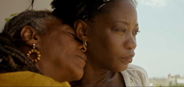 Olunike Adeliyi and Maxine Simpson in “Village Keeper” (2024) directed by Karen Chapman.