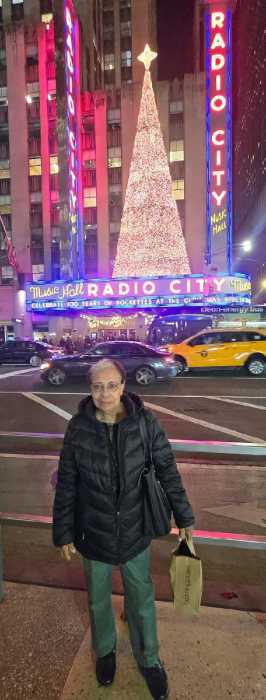 Jamaican Carmen Beverley in front of Radio City in Manhattan, New York.