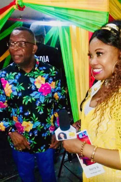 Social media blogger and TV host Special K shares lens time at the Rebel Salute 2019 concert in St Ann, Jamaica with radio broadcaster Barry G who passed away recently.