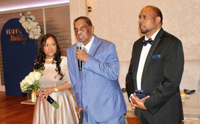Michael Persaud, father, between First Lady Rachael Persaud and Pastor Joseph. The senior praised his son, who leads Liberty Bible Fellowship Church in Ozone Park, Queens. The celebration included Pastor Joe's 60th birthday, and the renewing of his 35th wedding vows in the ballroom of the Crescent Beach Club in Bayville, Long Island, on Nov. 7, 2025.