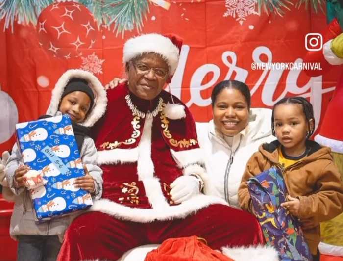Kids share a moment with Santa.