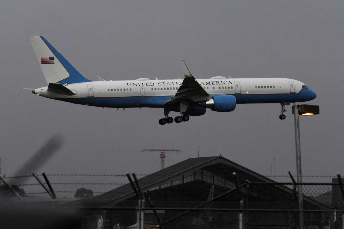 The aircraft carrying Chairman of the Joint Chiefs of Staff Gen. Dan Caine prepares to land ahead of talks with Prime Minister Kamla Persad-Bissessar on regional security and cooperation against transnational crime, at Piarco International Airport, in Piarco, Trinidad and Tobago, November 25, 2025.