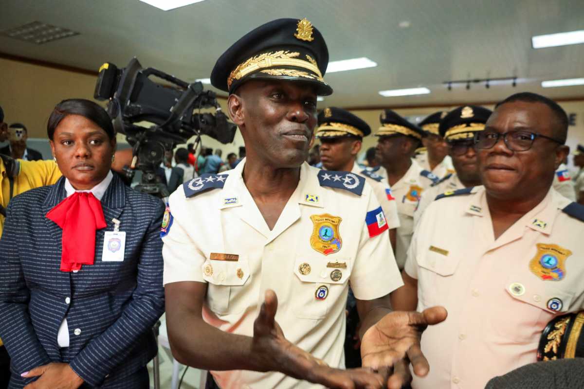 Vladimir Paraison, chief of the National Police, attends a press conference to present weapons and ammunition seized during different operations against gangs, in Port-au-Prince, Haiti, November 28, 2025.