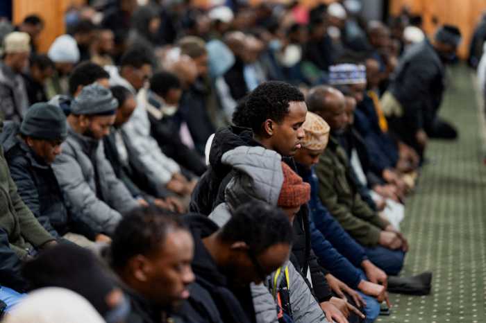Men take part in a weekly Friday Jum’ah prayer session at Abubakar As-Saddique Islamic Centre amid a reported ongoing federal immigration operation targeting the Somali community in Minneapolis, Minnesota, U.S., December 5, 2025.