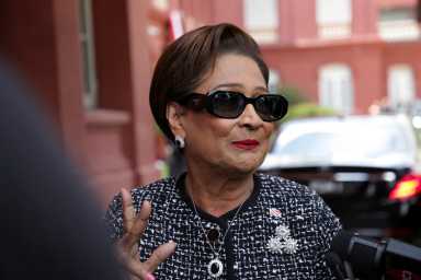 Prime Minister of Trinidad and Tobago Kamla Persad-Bissessar replies to the media after being asked about the presence of U.S. military in the southern Caribbean, at the Red House, parliamentary building, in Port of Spain, Trinidad and Tobago, September 12, 2025.