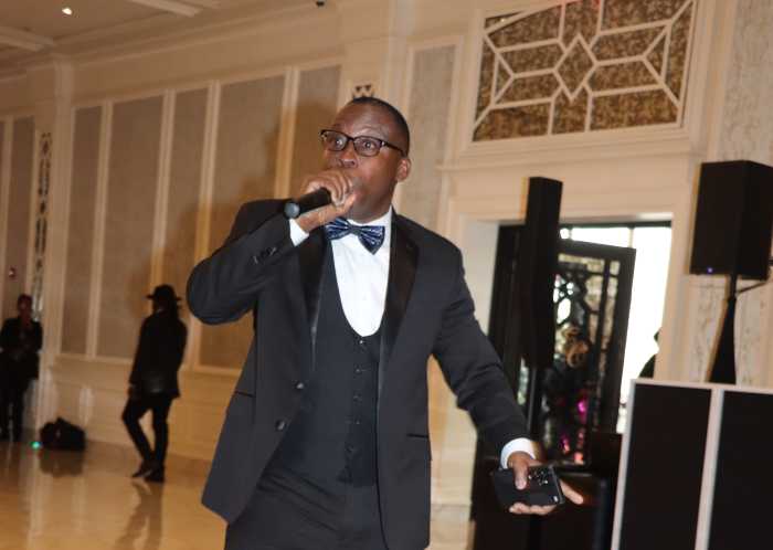Gerard Placide electrifies at VINCI annual pre-Christmas gala.