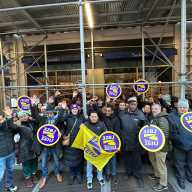 Office cleaners who service 373 and 381 Park Ave South in Manhattan rally outside 381 Park Ave on Nov. 20.