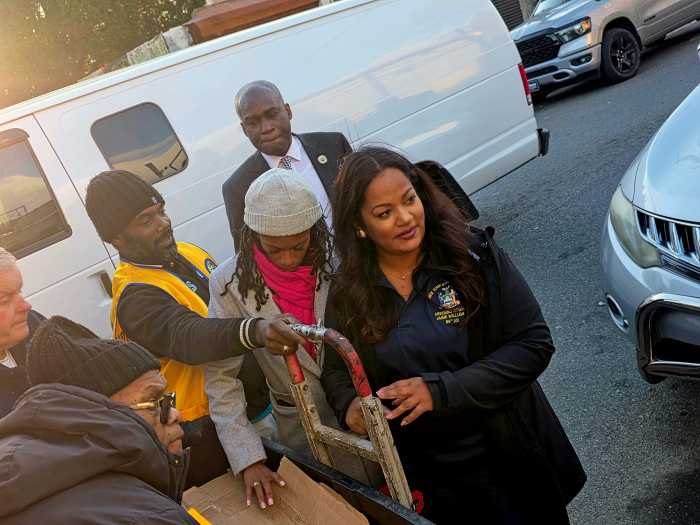 Assembly Member Jaime Williams, forefront, with Assembly Member Monique Chandler-Waterman to her immediate right.