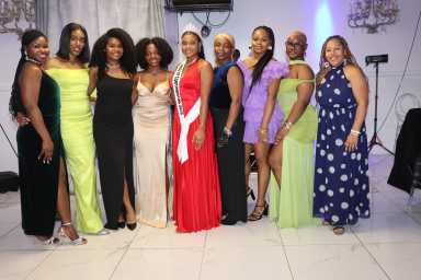 Yvonne Peters, sixth from left, and Adonna Lewis Dudley, right, with past and prospective Miss New York Continental Cultural Pageant contestants.