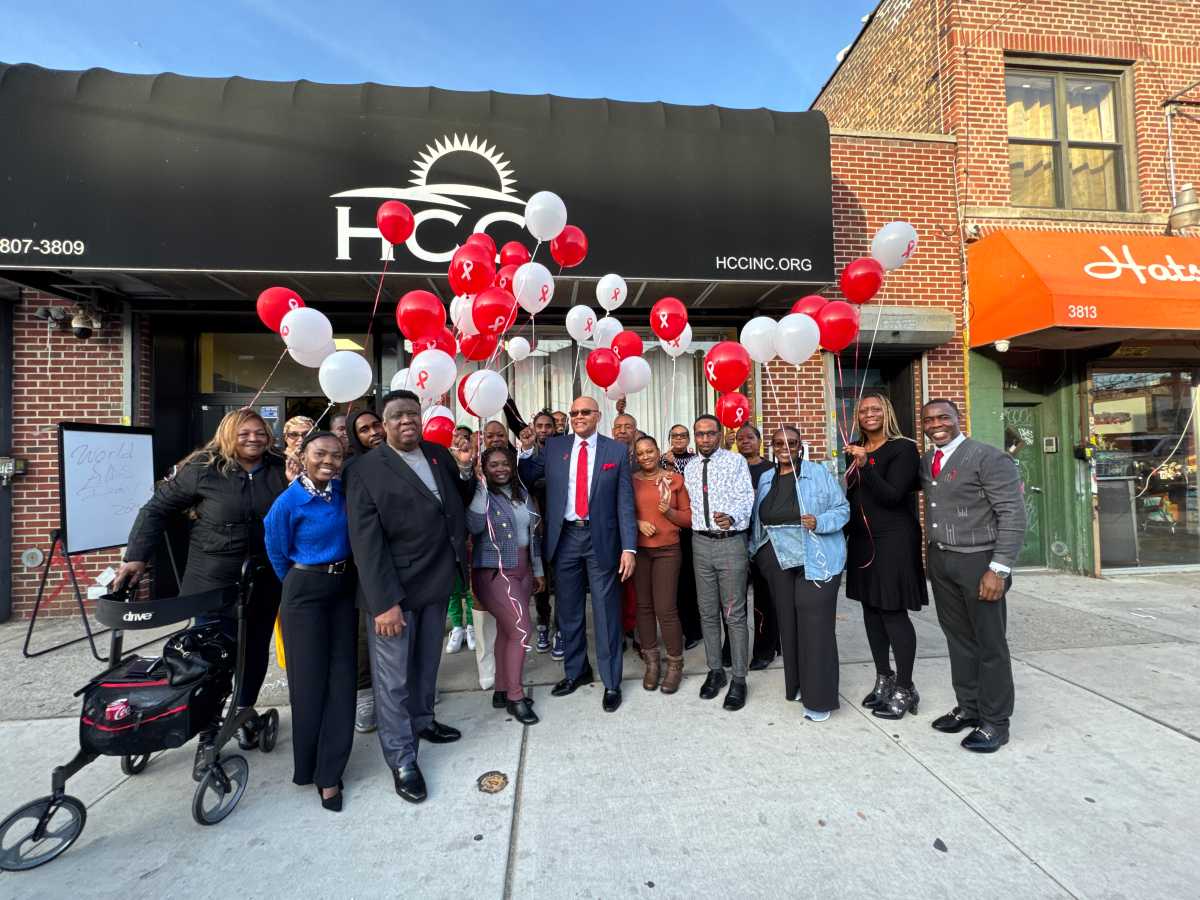 Members of HCC prepare to release the ballons memorializing those lost to AIDS.