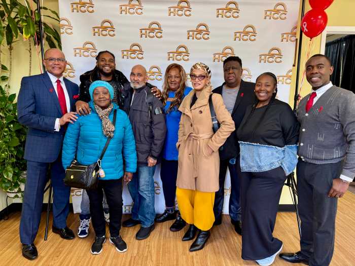 Dr. Andre Peck & Jean Pierre-Louis with HIV/AIDS Peer Advocates.