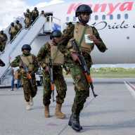 Kenyan police officers disembark in Haiti to join an expanded multinational force with a mandate to fight gangs, at Toussaint Louverture International Airport, in Port-au-Prince, Haiti Dece. 8, 2025.