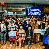 Candidate for Assembly Member in District 59, Jibreel Jalloh, sixth from left, (holding microphone) surrounded by residents, faith leaders, business owners, veterans,political organizations, and supporters at a Nov 30, campaign launch for Assembly Member of District 59.