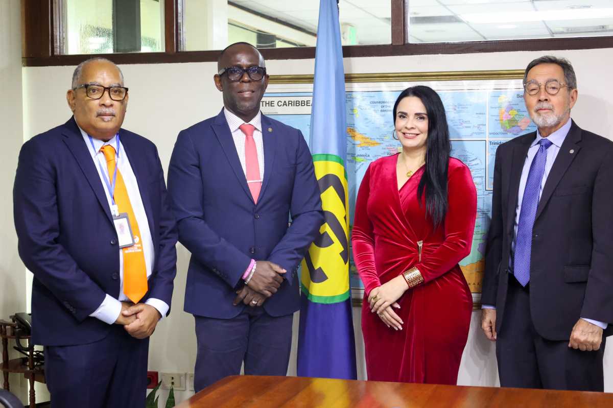 From left, WTCG Executive Director Wesley Kirton; CARICOM Deputy Secretary General Dr. Armstrong Alexis; Dr. Olinda Salguero Vice President Latin American &; Caribbean Presidential Mission; and John Dickson, a director of the Presidential Mission.
