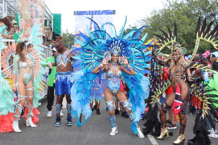 Masqueraders from Sesame Flyers' "Enchanted.”