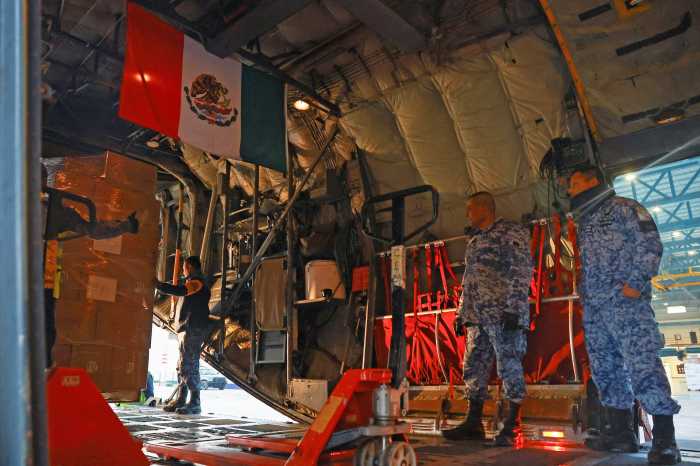 Members of the Mexican Air Force load a cargo plane with humanitarian aid destined for Jamaica to help people affected by Hurricane Melissa at the Santa Lucia military air base in Zumpango de Ocampo, Mexico Jan. 16, 2026.
