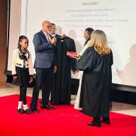 Judge Chidi Eze reciting the oath of office in the presence of his family.