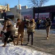 A screengrab from a video obtained by Reuters shows a law enforcement officer spraying irritants at a man identified as Alex Pretti, before he was fatally shot when federal agents were trying to detain him in Minneapolis, January 24, 2026.