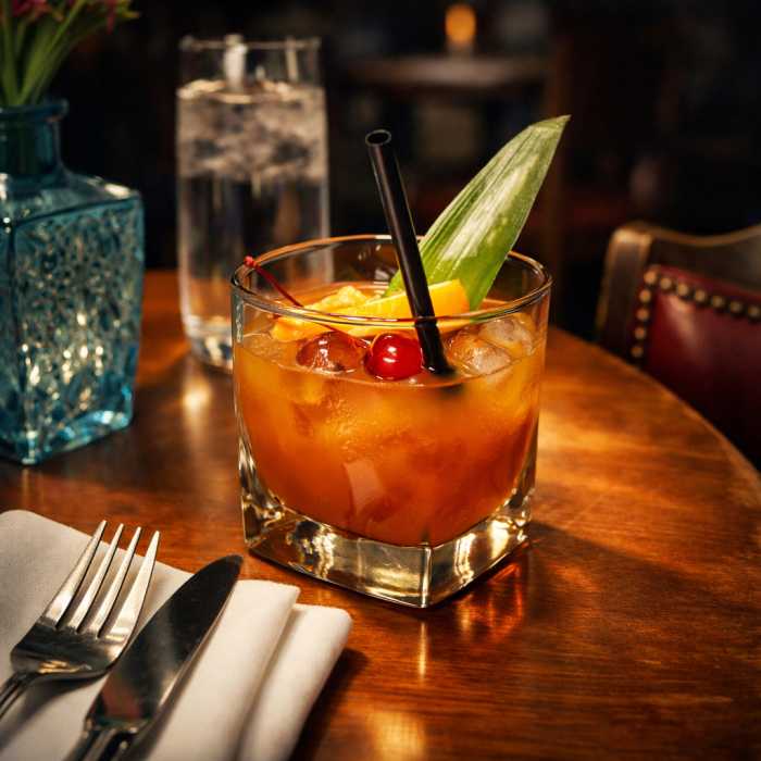 Colorful mocktails and cocktails, including the Island Breeze, are served at Bar Manje, complementing the restaurant’s Caribbean-inspired menu with bright, tropical flavors.