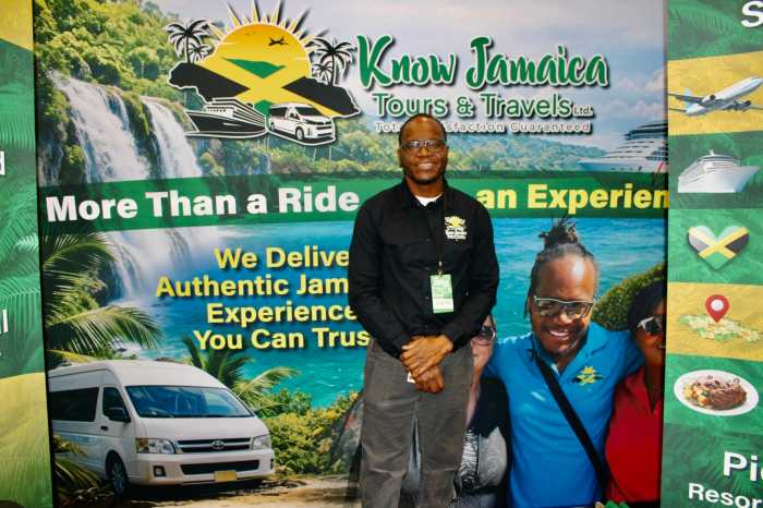 Javia Shaw, against the backdrop of aquamarine water, and happy customers, praised his family company Know Jamaica Tours & Travels for sharing jaunts that represent the rich cultural and history of the island nation. Shaw was one of hundreds of presenters at the 2026 New York Travel & Adventure Show, at the Jacob Javits Center in New York City, on Jan. 24, 2026.