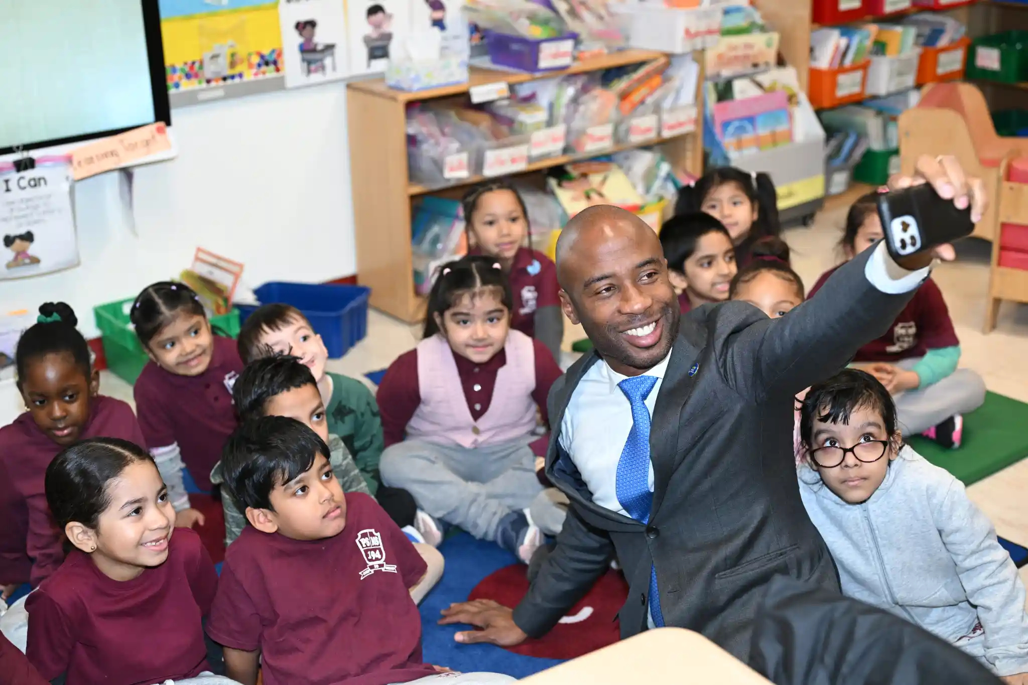New Schools Chancellor Kamar Samuels with students of P.S./M.S. 194 in the Bronx.