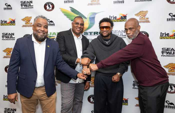 Jamaica Strong Executives (from left) Bobby Clarke, Irie Jam radio; Kacy Rankine, Roadblock radio; and George Crooks (R), Jammins Events share lens time with GRAMMY-winning dancehall/reggae icon Shaggy (3rd from left).