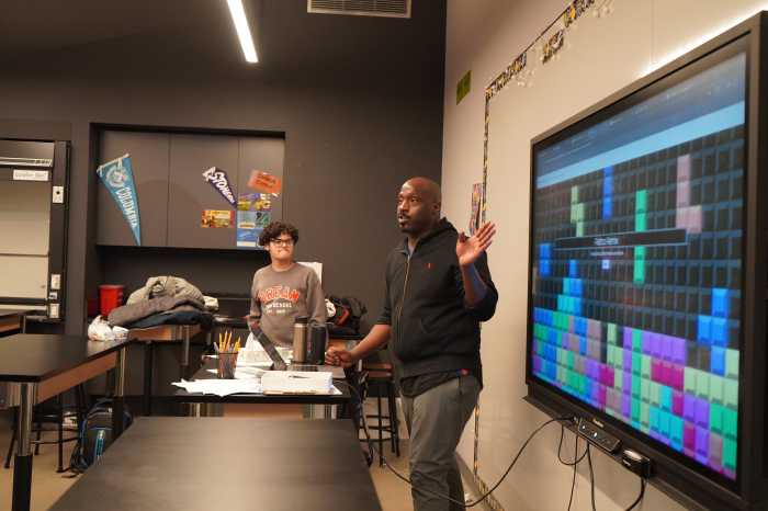 Students participate in The Knowledge House’s in-school technology programming during a session at the Dream Charter School.
