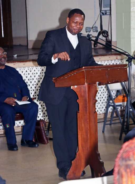 Rev. Morais G. Quissico, pastor of St. Mark’s UMC and BUSS parish coordinator, addresses congregants. The Rev. Melvin Boone, senior pastor at Vanderveer Park United Methodist Church (UMC) in East Flatbush, Brooklyn, is in the background.