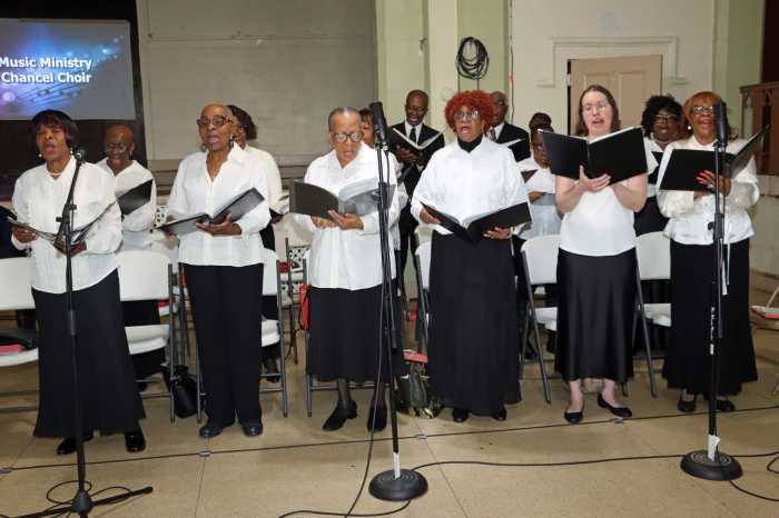 USS Combined Choir Clergy sings during the MLK Celebration.