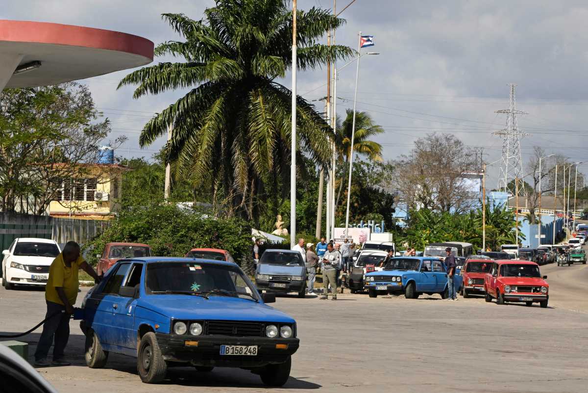 A driver fills up his tank at a gas station with gasoline as Cuban President Miguel Diaz-Canel announces his government will roll out a plan in the next week to confront fuel shortages as the U.S. moves to block the supply of oil, in Havana, Cuba Feb. 5, 2026.