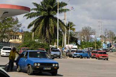 A driver fills up his tank at a gas station with gasoline as Cuban President Miguel Diaz-Canel announces his government will roll out a plan in the next week to confront fuel shortages as the U.S. moves to block the supply of oil, in Havana, Cuba Feb. 5, 2026.