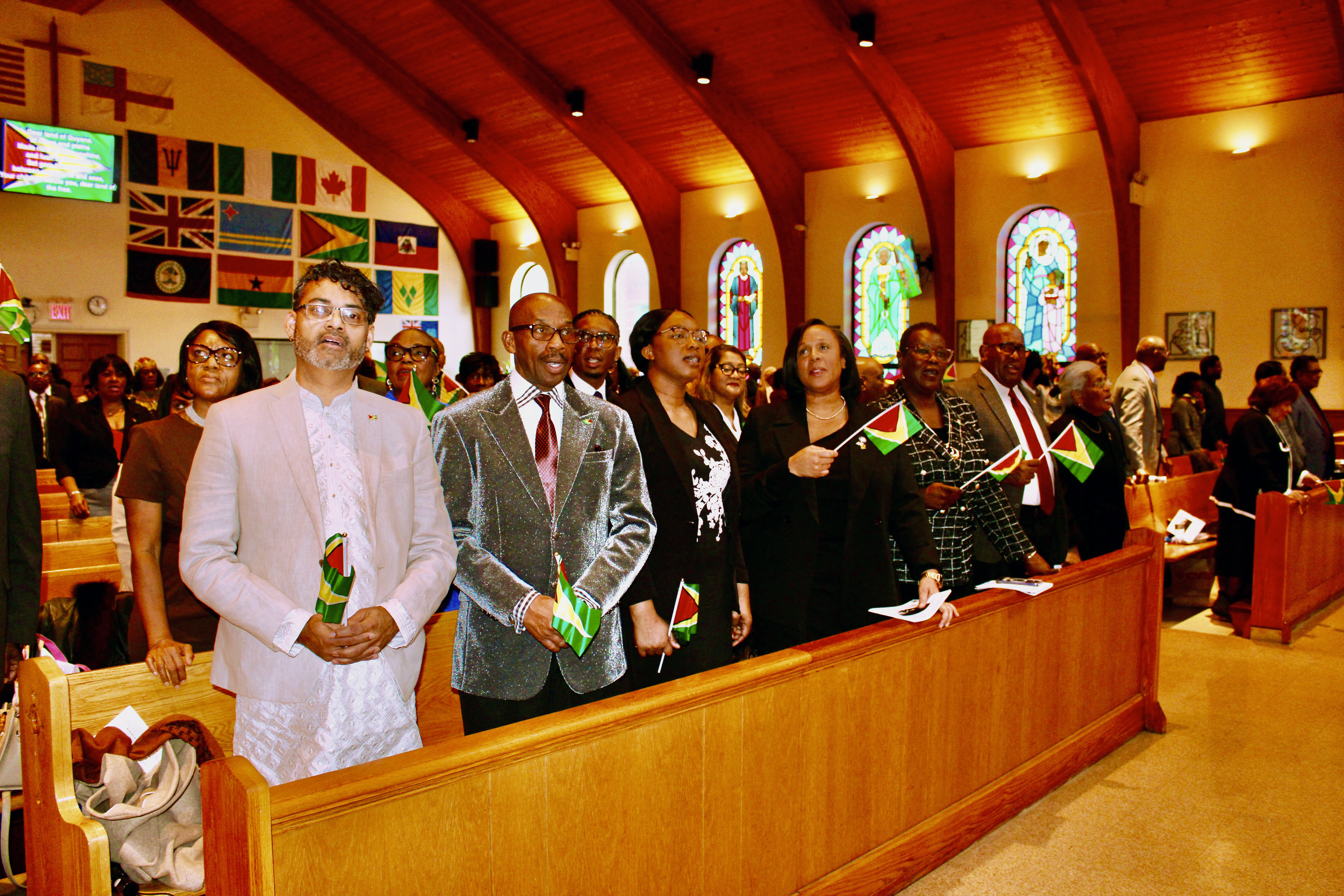 The diplomatic offices celebrated Guyana's 56th Republic Anniversary with an Interfaith Service at St. Gabriel's Episcopal Church on Feb. 23. From left, Pandit Ravi Doobay, Pastor James Richmond, Minister Counsellor Marissa Edsards, Assembly Member Alicia Hyndman, Senator Roxanne Persaud, Consul General of Guyana to NY, Ambassador Michael E. Brothrson, and President of the Guyana Cultural Association Ave-Marie Brewster-Haynes.
