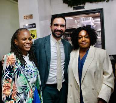 Mayor of the City of New York Zohran K. Mamdani, center, with Assembly Member Monique Chandler-Waterman, left, and owner of the Hills Restaurant Doris Rodney, after a 2025 walkabout in Little Caribbean in Brooklyn.