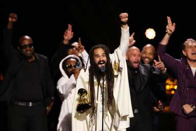Keznamdi accepts the Best Reggae Album award for "BLXXD & FYAH" during the premiere ceremony of the 68th Annual Grammy Awards in Los Angeles, California, U.S., Feb. 1, 2026.