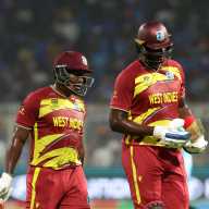 Cricket - ICC Men's T20 World Cup 2026 - Super 8 - India v West Indies - Eden Gardens, Kolkata, India - March 1, 2026 West Indies' Rovman Powell and Jason Holder walk back to the pavilion at the end of the innings.