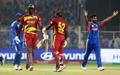 ICC Men's T20 World Cup 2026 - Super 8 - India v West Indies - Eden Gardens, Kolkata, India - March 1, 2026 West Indies' Rovman Powell and Jason Holder celebrate at the end of the innings.