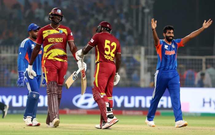 ICC Men's T20 World Cup 2026 - Super 8 - India v West Indies - Eden Gardens, Kolkata, India - March 1, 2026 West Indies' Rovman Powell and Jason Holder celebrate at the end of the innings.