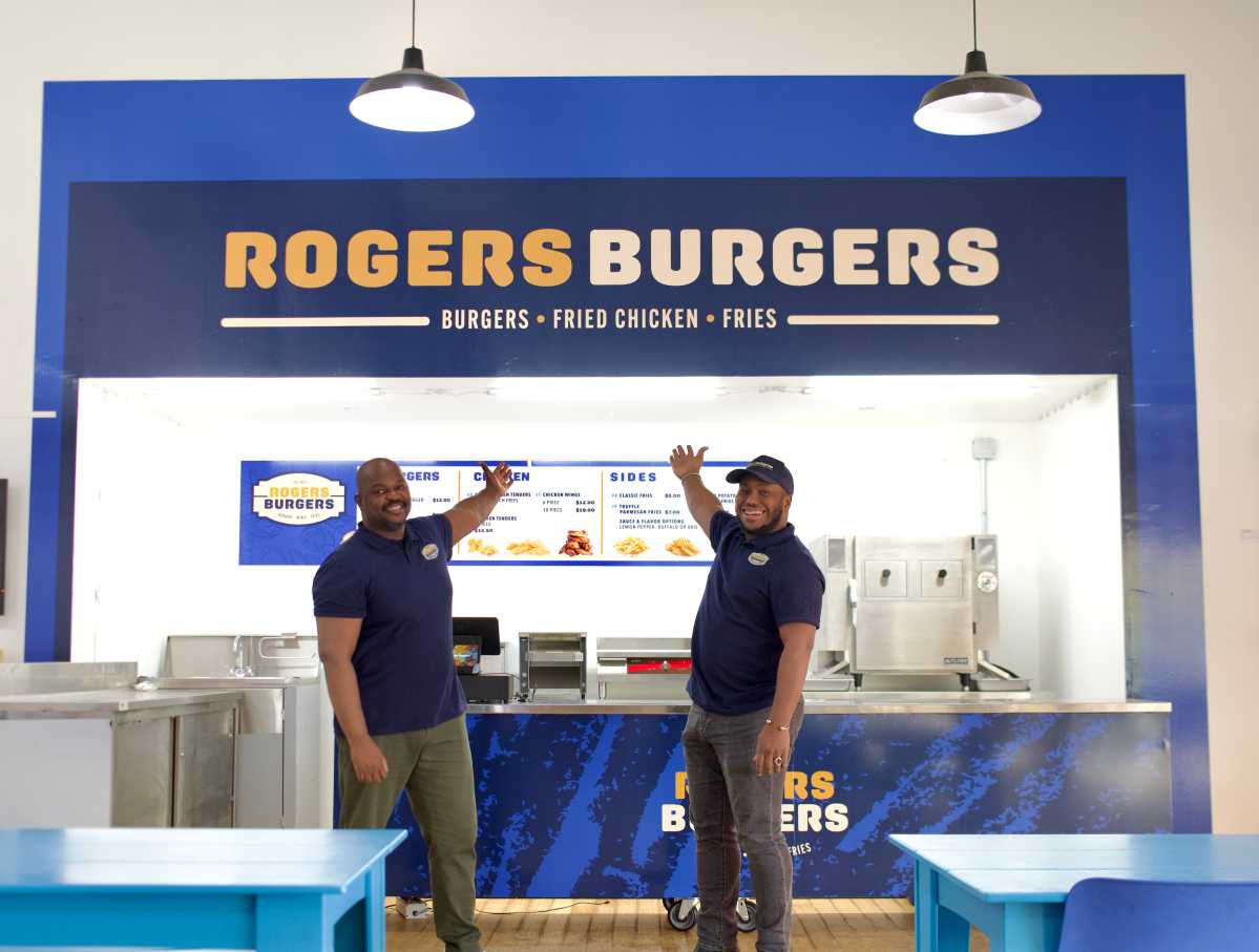 Josue Pierre, district leader and co-founder of Rogers Burgers (left) with Jonathan Pierre Lafleur, executive director of Atelier Artist and co-founder of Rogers Burgers.