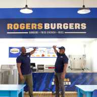 Josue Pierre, district leader and co-founder of Rogers Burgers (left) with Jonathan Pierre Lafleur, executive director of Atelier Artist and co-founder of Rogers Burgers.