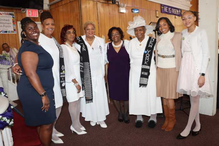 Pastor Heidi Thomas, fourth from left, with members of Crawford Memorial United Methodist Church, who trekked from the Bronx to support her.