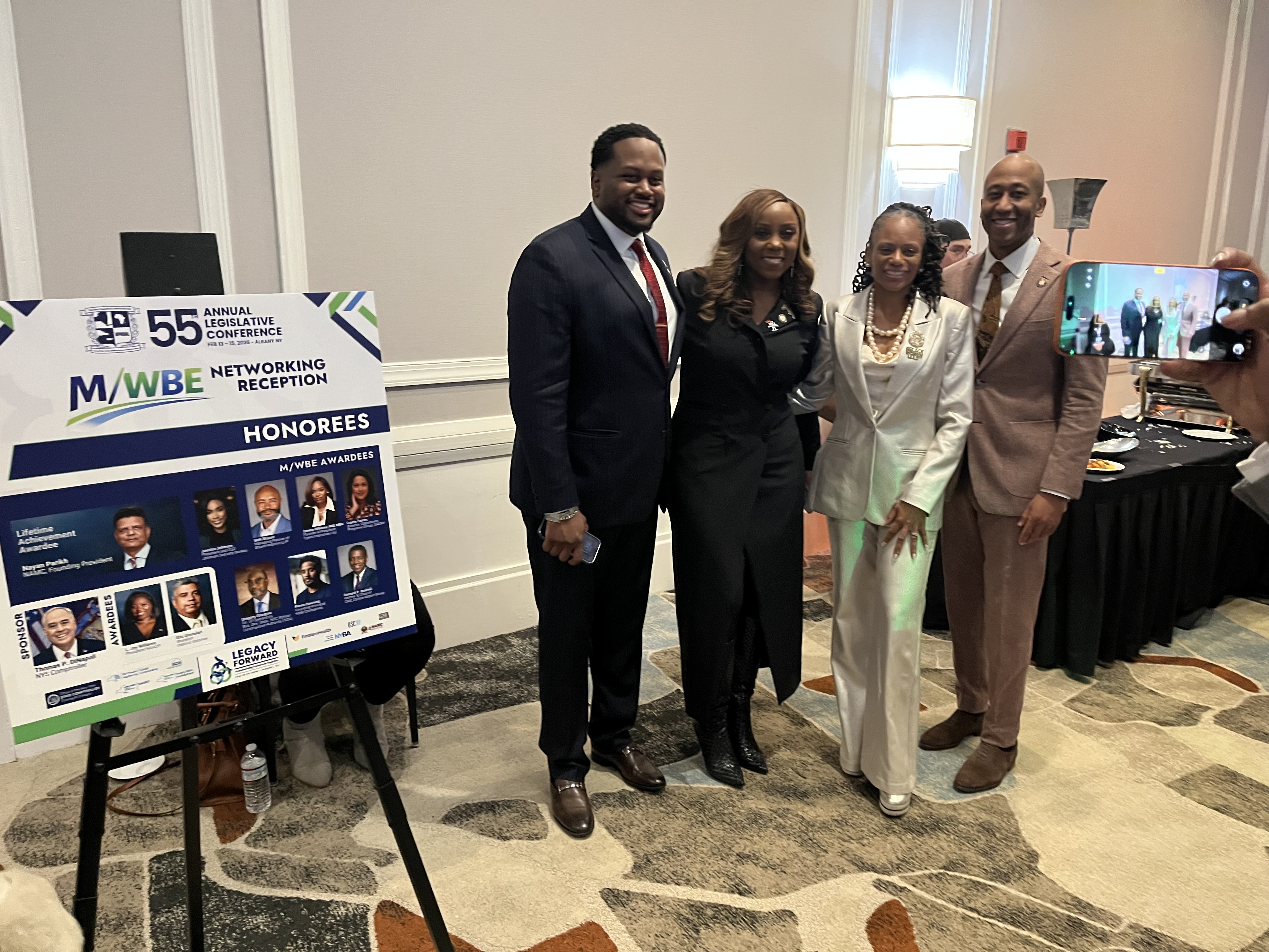 Tyrell Hankerson and Farah Louis, both New York City Council Members; Monique Chandler-Waterman, New York State Assemblywoman; and Clyde Vanel, New York State Assemblyman, attend an MWBE Networking Reception hosted by Rodneyse Bichotte Hermelyn, New York State Assemblywoman, during the 55 Annual Legislative Conference in Albany this year 2026. The event connected minority- and women-owned business with government leaders to promote awareness, inclusion, and support.