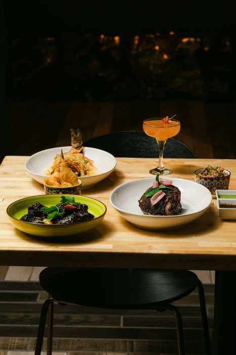 Guinness stout–braised oxtail, escovitch whole branzino and roasted Walkerswood jerk chicken showcase the rich, vibrant flavors of the Caribbean at Dougla Kitchen, where chef Andrew Black blends heritage and bold island spices on every plate. 