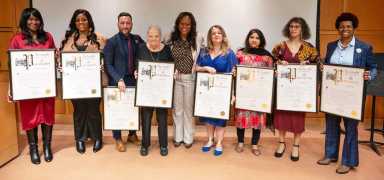 Assembly Member Rodneyse Bichotte Hermelyn (center) with honorees.