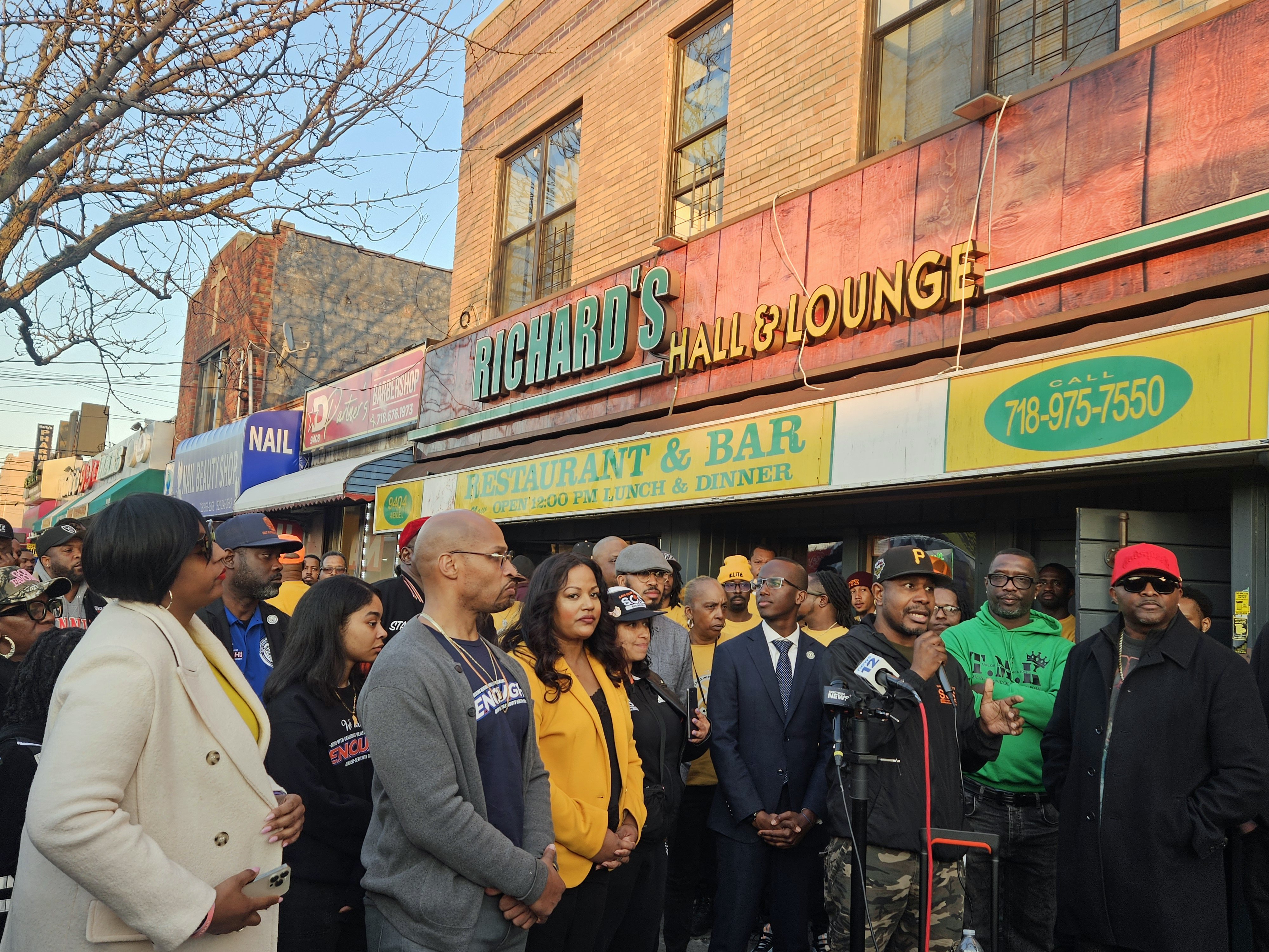 A coalition of organizations, elected officials, on on March 8, demanded funding and resources to end gun violence, after a mass shooting outside Richard's Restaurant & Bar on Avenue L, in Canarsie, Brooklyn, over the weekend. From left, are Senator Roxanne Persaud’s Chief of Staff Tanequa Strong, a representative from Enough is Enough, NYS Assembly Member (AD59) Jamie Williams, organizer, Jibreel Jalloh (sixth from left), a speaker from Save Our Streets (SOS), and Founder & CEO of Man Up Inc. Andre T. Mitchell.