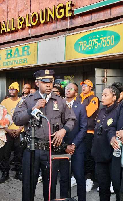 NYPD Officer Deane M. Powell of the 69th Precinct addressed a gathering, as organizer Jibreel Jalloh, Captain Sashanna Wynter, Commanding Officer of the 69th Precinct listened. Next to her, is Founder & CEO of Man Up Inc. Andre T. Mitchell. The community leaders and residents called for more resources to end gun violence, during a press conference on March 8, outside Richard's Restaurant & Bar on Ave. L in Canarsie, Brooklyn, where four patrons were injured.