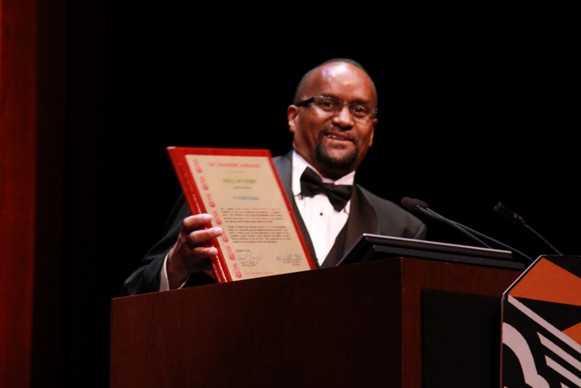 Don “Sunshine” Diaz accepting the SUNSHINE Awards Hall of Fame Induction for his father, Cyril Diaz in 2011.